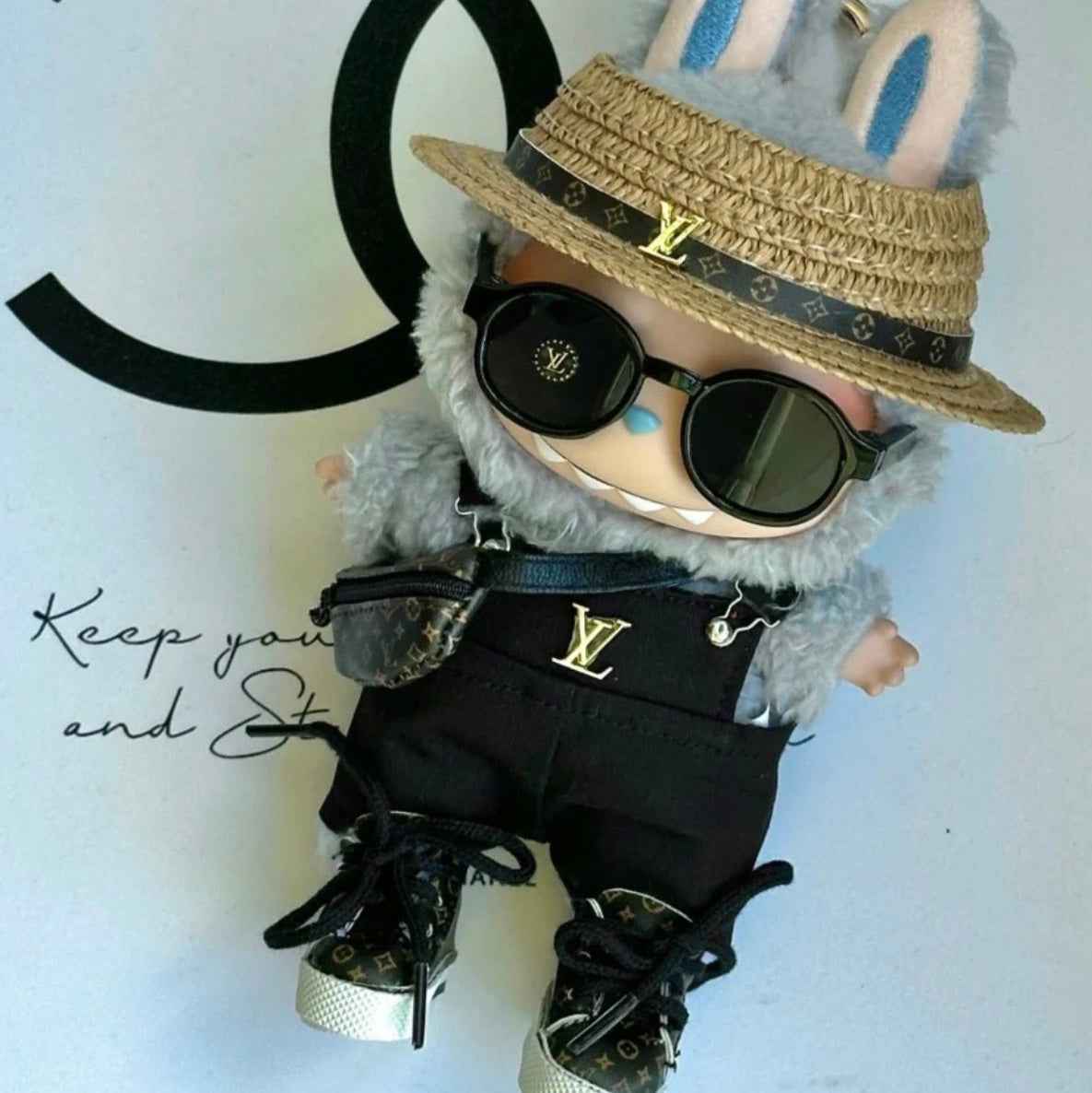 Tenue en salopette Louis Vuitton noire