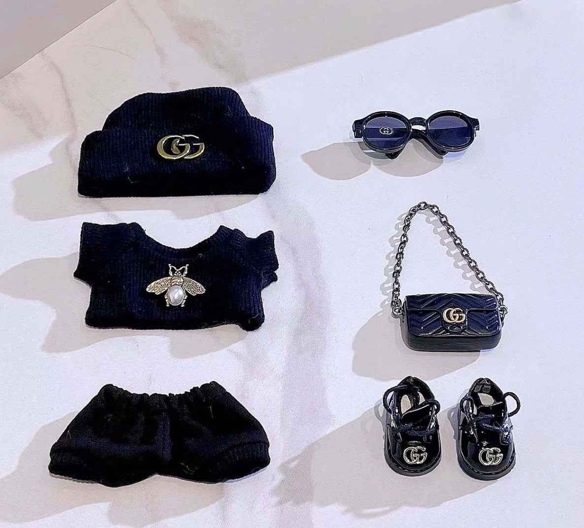 Gucci-outfit med bimotiv