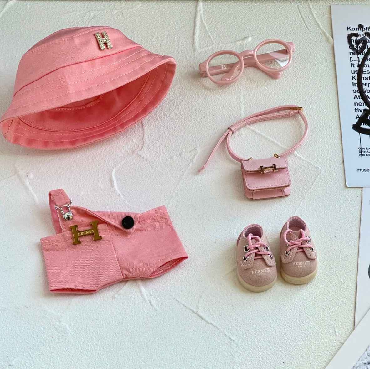 Tenue de luxe rose Hermès
