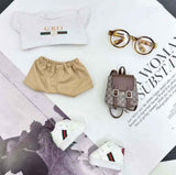 Gucci-outfit i afslappet streetwear-stil
