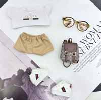 Gucci-outfit i afslappet streetwear-stil